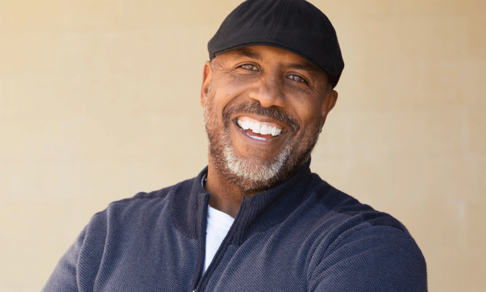 Middle-aged man smiling with a confident, healthy smile