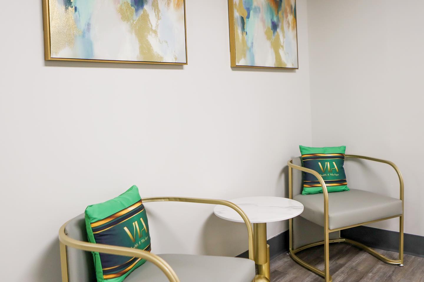 Seating area with green VIA pillows in our Chandler office