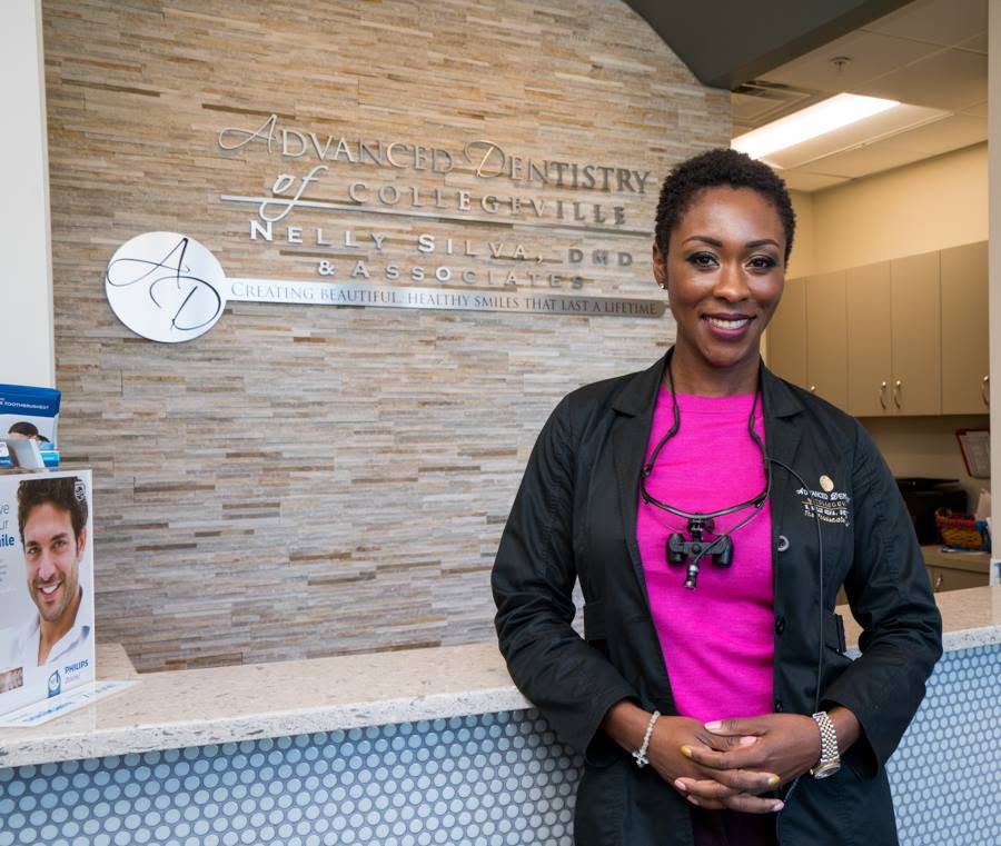 Dr. Nelly Silva at the front desk of our Collegeville dental office