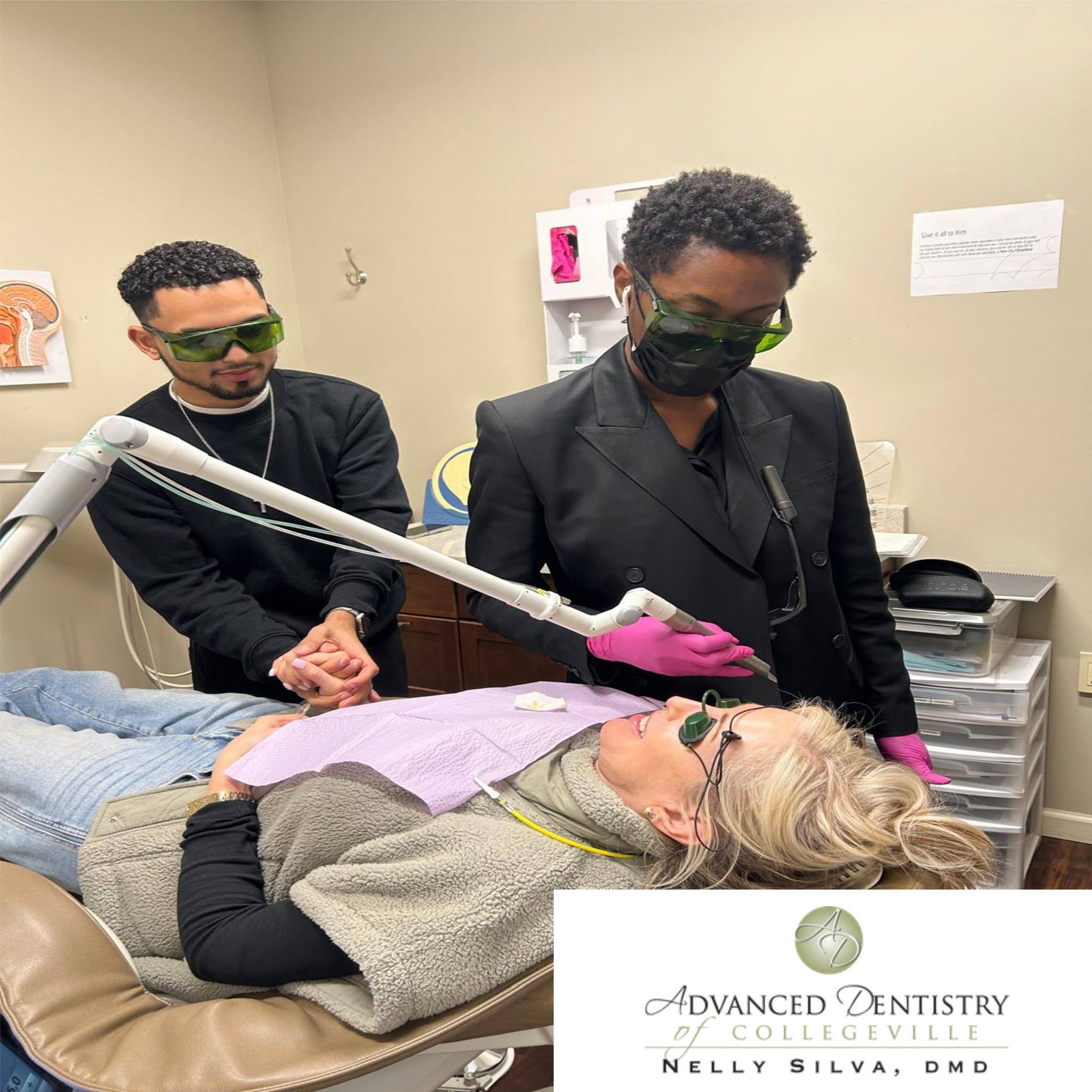 Dr. Nelly Silva performing laser dentistry on a patient wearing protective eyewear in a Collegeville treatment room
