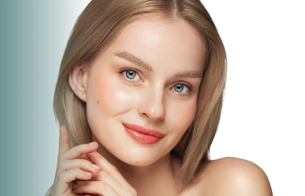 Woman with smooth, glowing skin touching her face against a light blue background