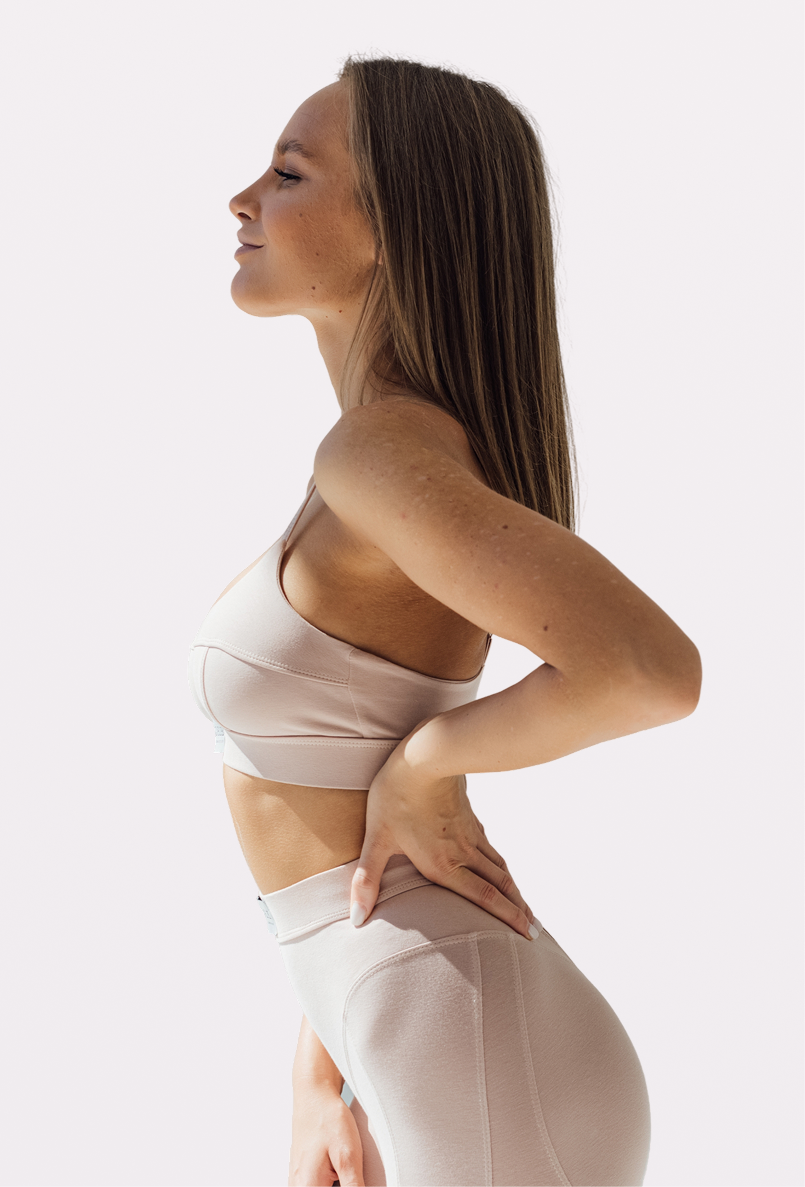 Woman in profile showing defined waistline and contoured body shape