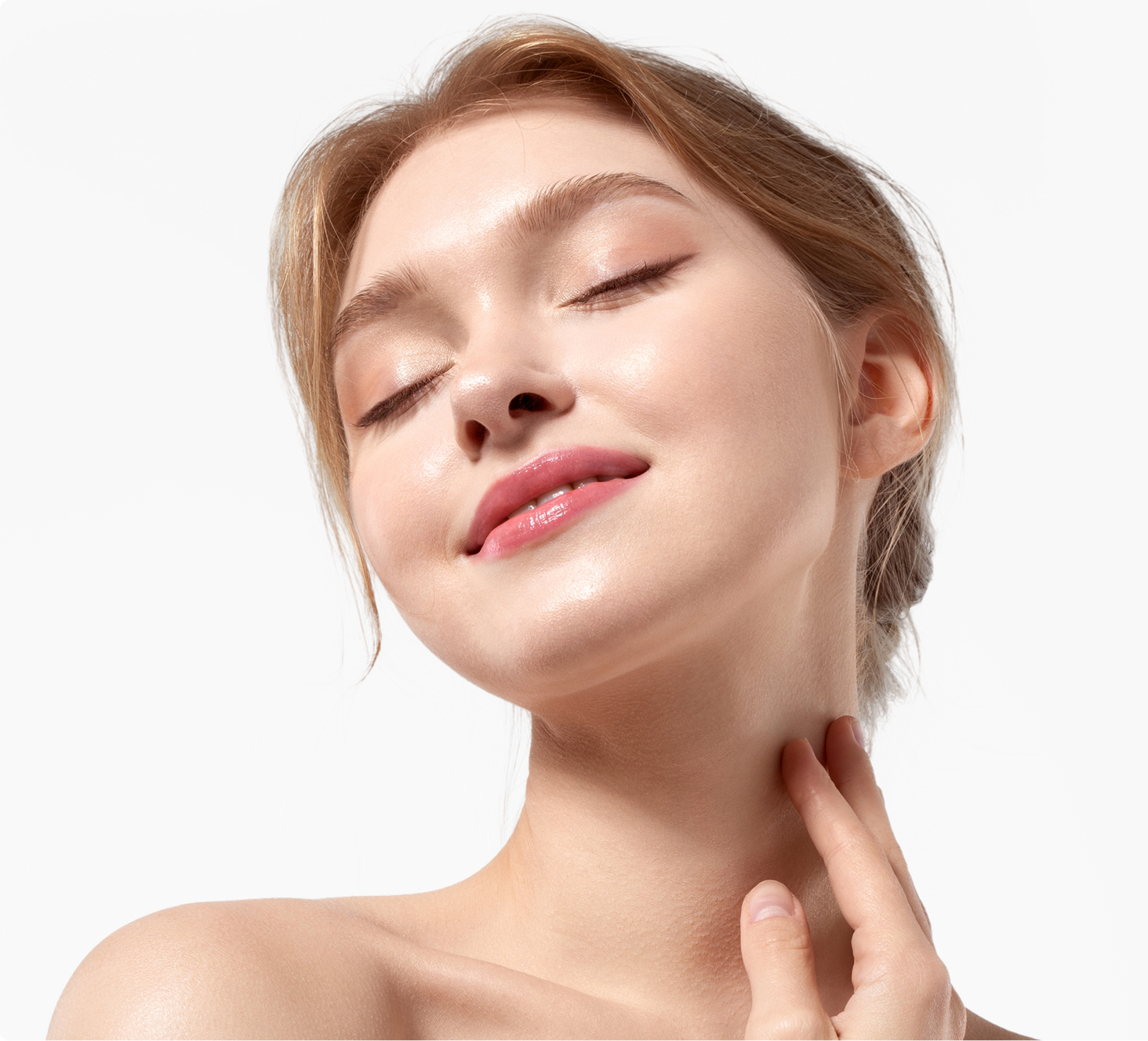 Woman with eyes closed touching neck with relaxed expression