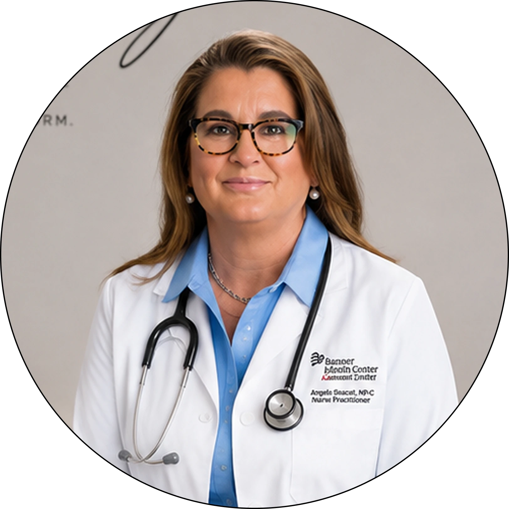 Angela Bascal, MNC Nurse Practitioner, wearing white coat and stethoscope