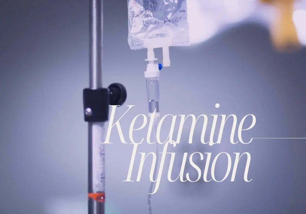 IV drip with ketamine infusion bag suspended on a stand