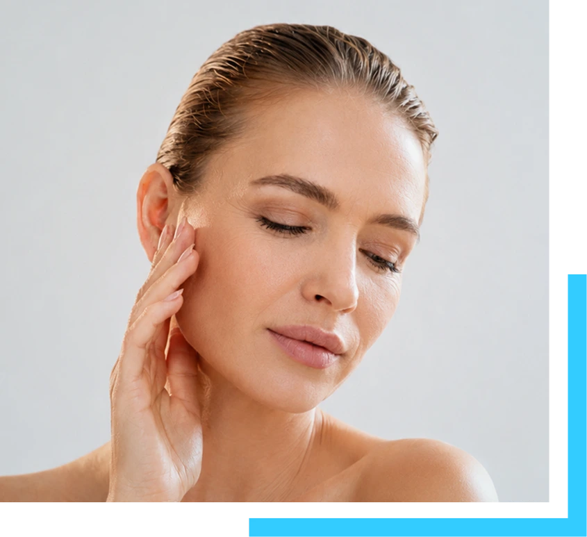 Woman touching her face with hands, demonstrating skin firmness and texture
