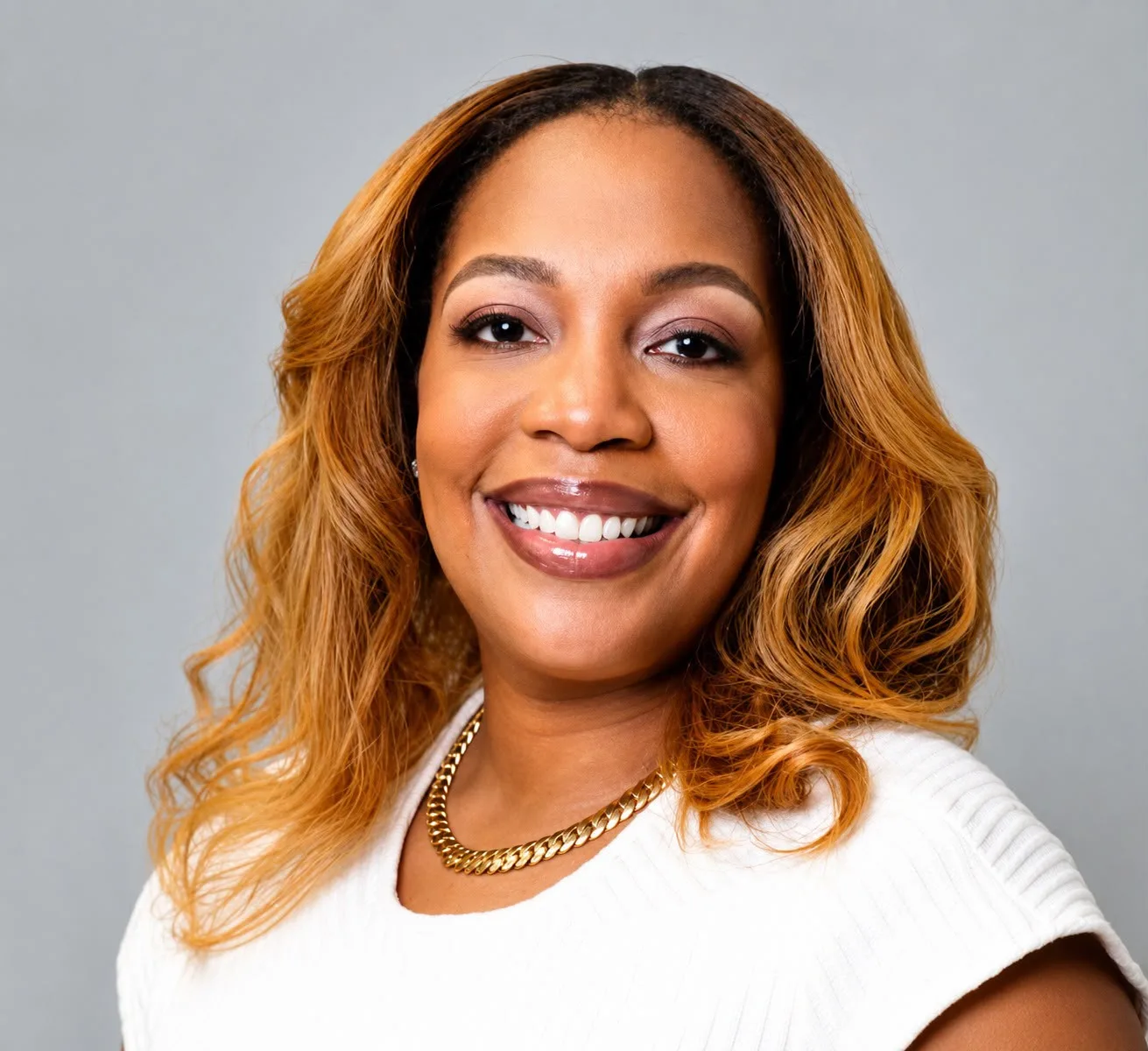 Dominique Bonner, Dentcare Now team member, smiling at camera