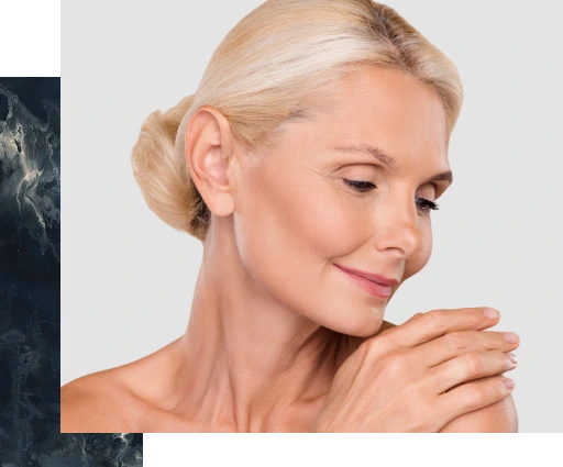 Woman with blonde hair in side profile touching her cheek, demonstrating facial skin rejuvenation