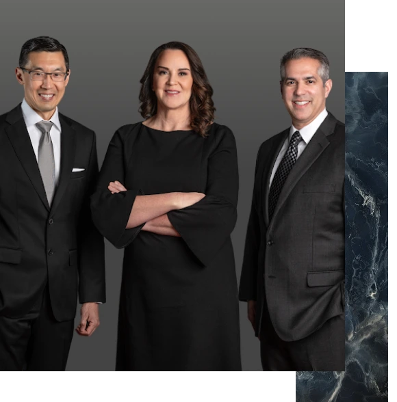 David C. Yao, MD, FACS, Molly F. Walsh, DO, and Vas N. Sabeeh, DO, FACS standing together in professional attire