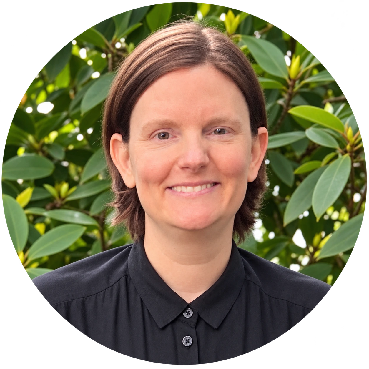 Rebecca New, a team member at Insights Psychological Services, smiling in a circular headshot with green foliage background