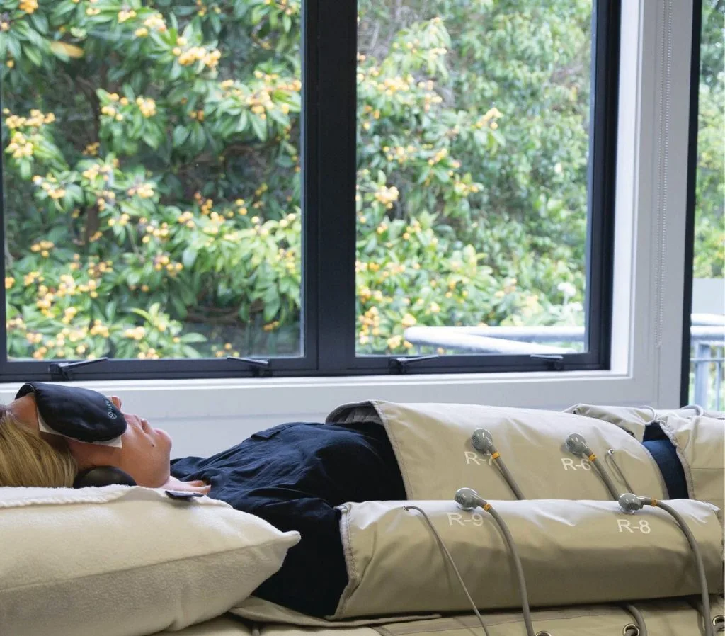 Patient resting during a FlowPresso lymphatic massage session