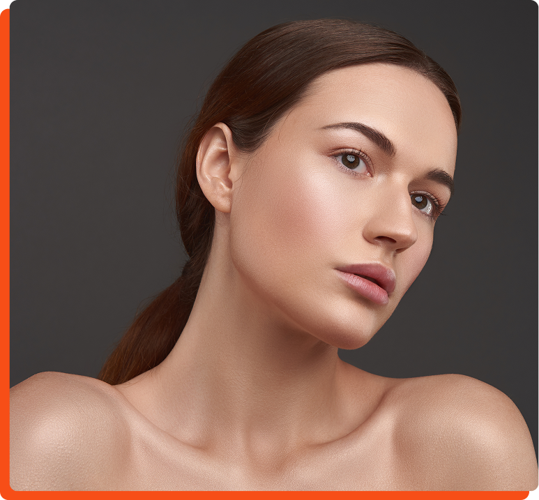 Woman with brunette hair in profile against dark gray background
