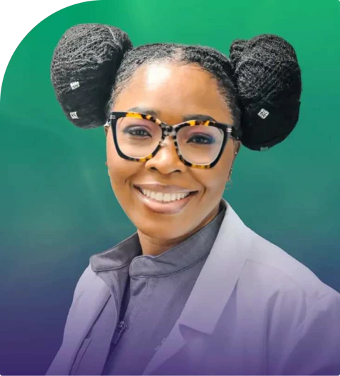 Dr. Judith Ngulefac, DNP, APRN, PMHNP-BC, FNP-C, smiling in a lavender lab coat