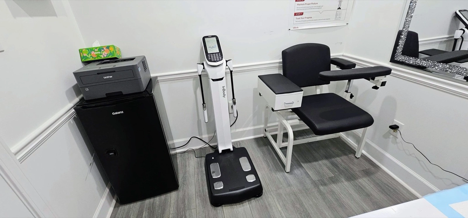 Body composition analyzer and blood draw chair in the MindBodySoul lab room