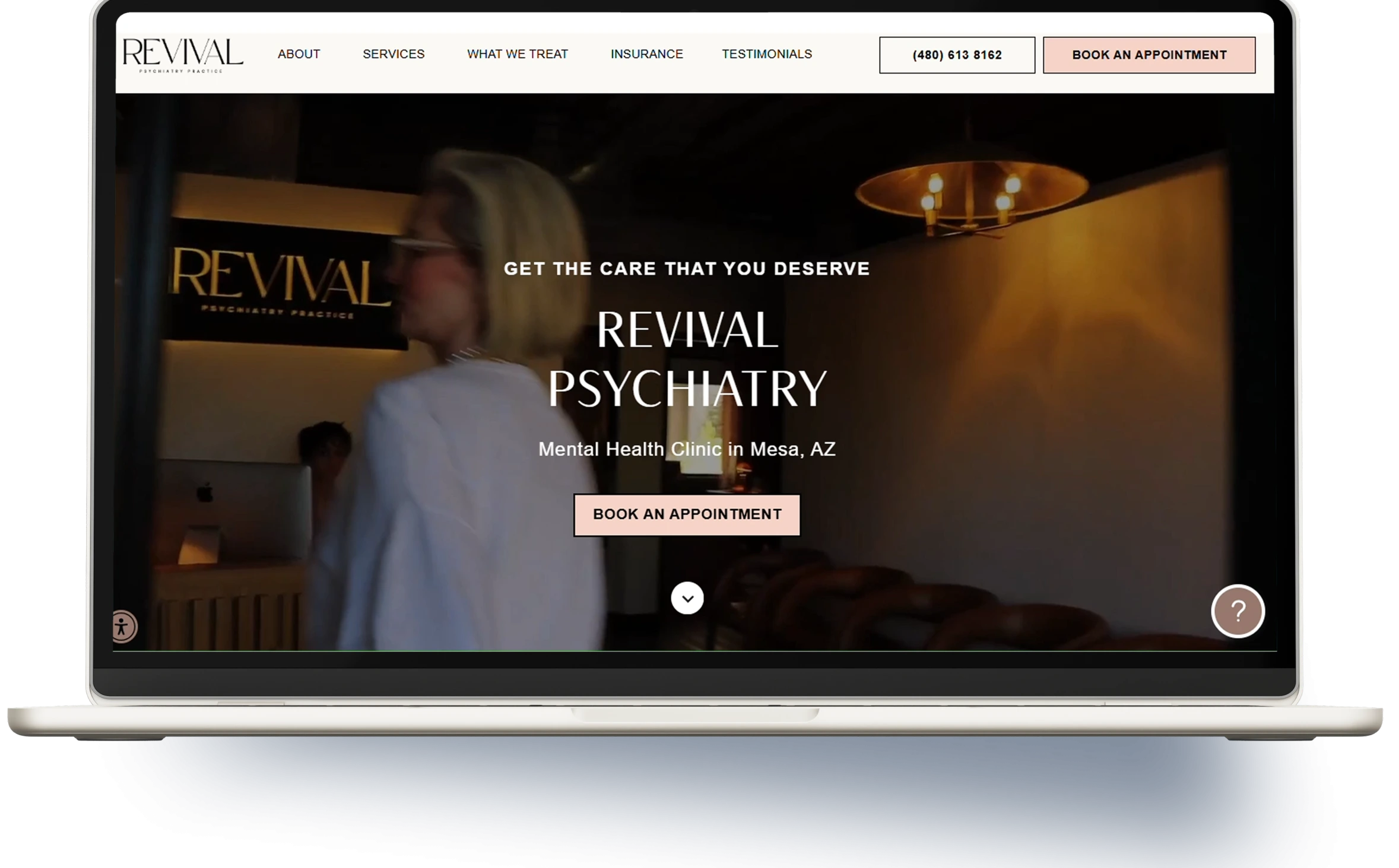 Laptop displaying a website video