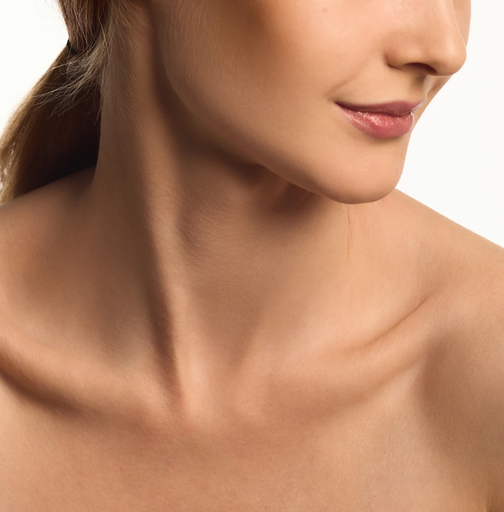 Woman's profile showing defined jawline and smooth neck contour