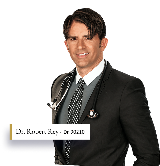 Dr. Robert Rey in professional attire with stethoscope, smiling at camera