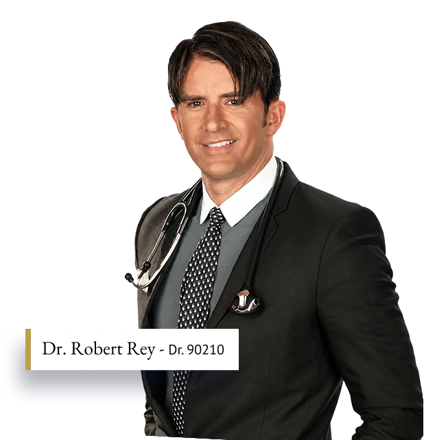 Dr. Robert Rey in professional attire with stethoscope, smiling at camera