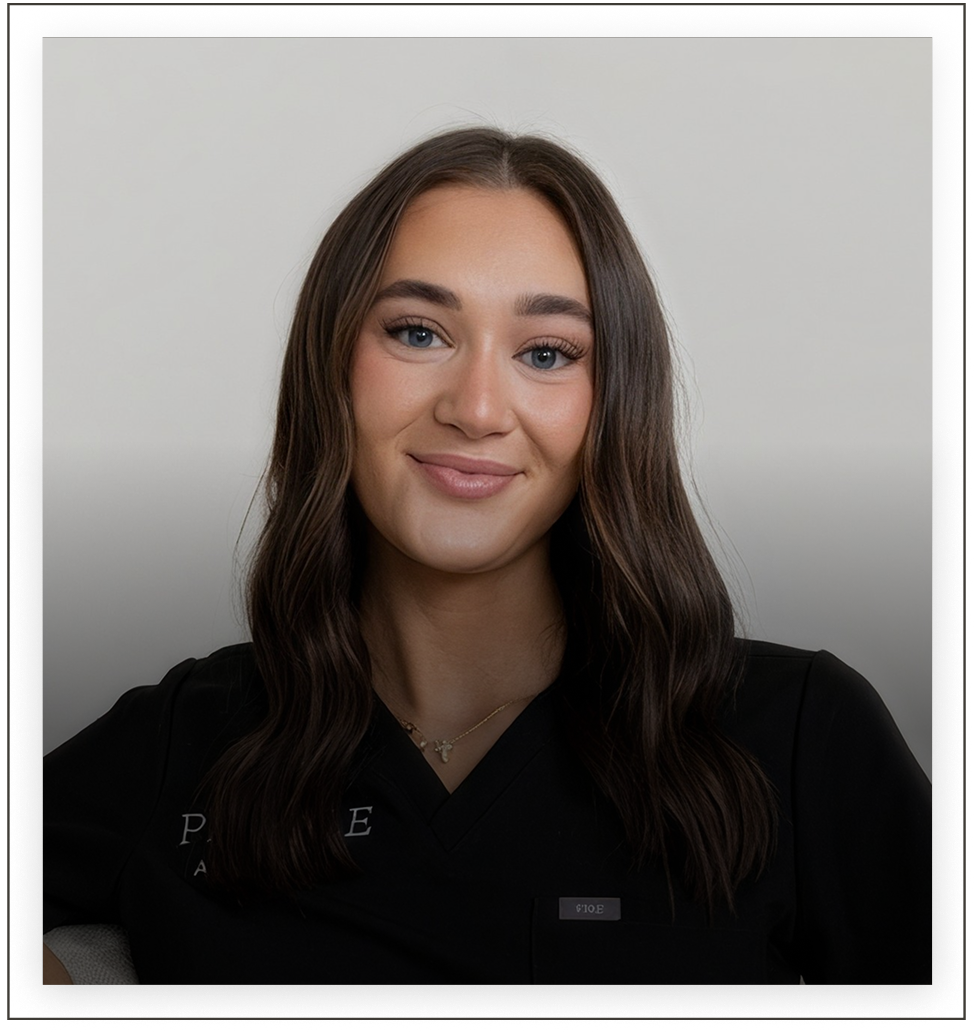 Profile Aesthetics team member in black scrubs against neutral background
