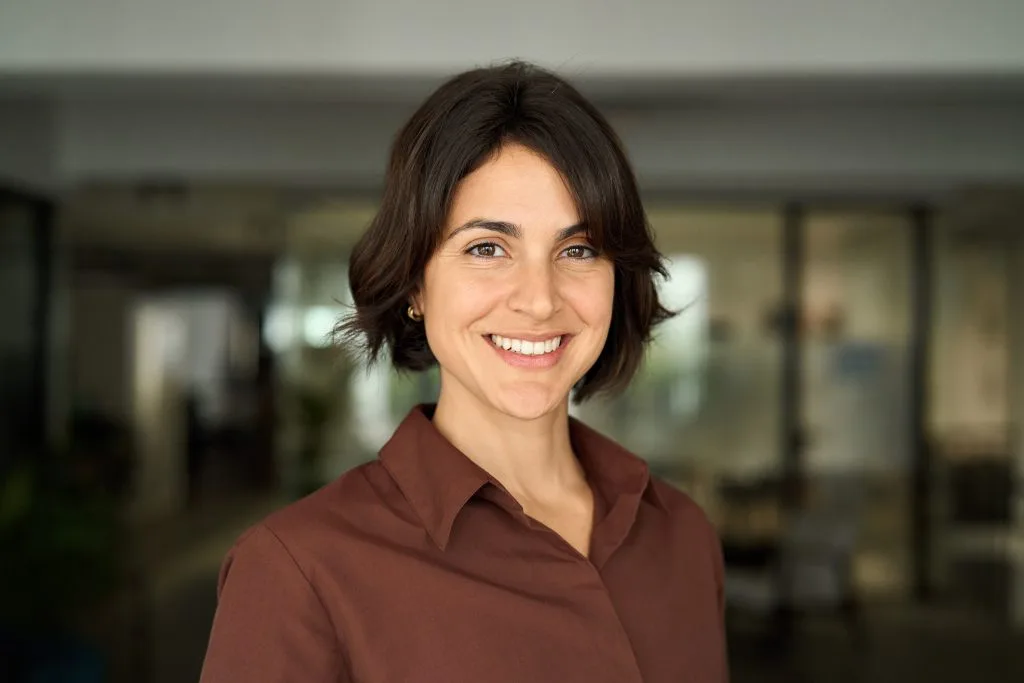 Smiling therapist in a professional office