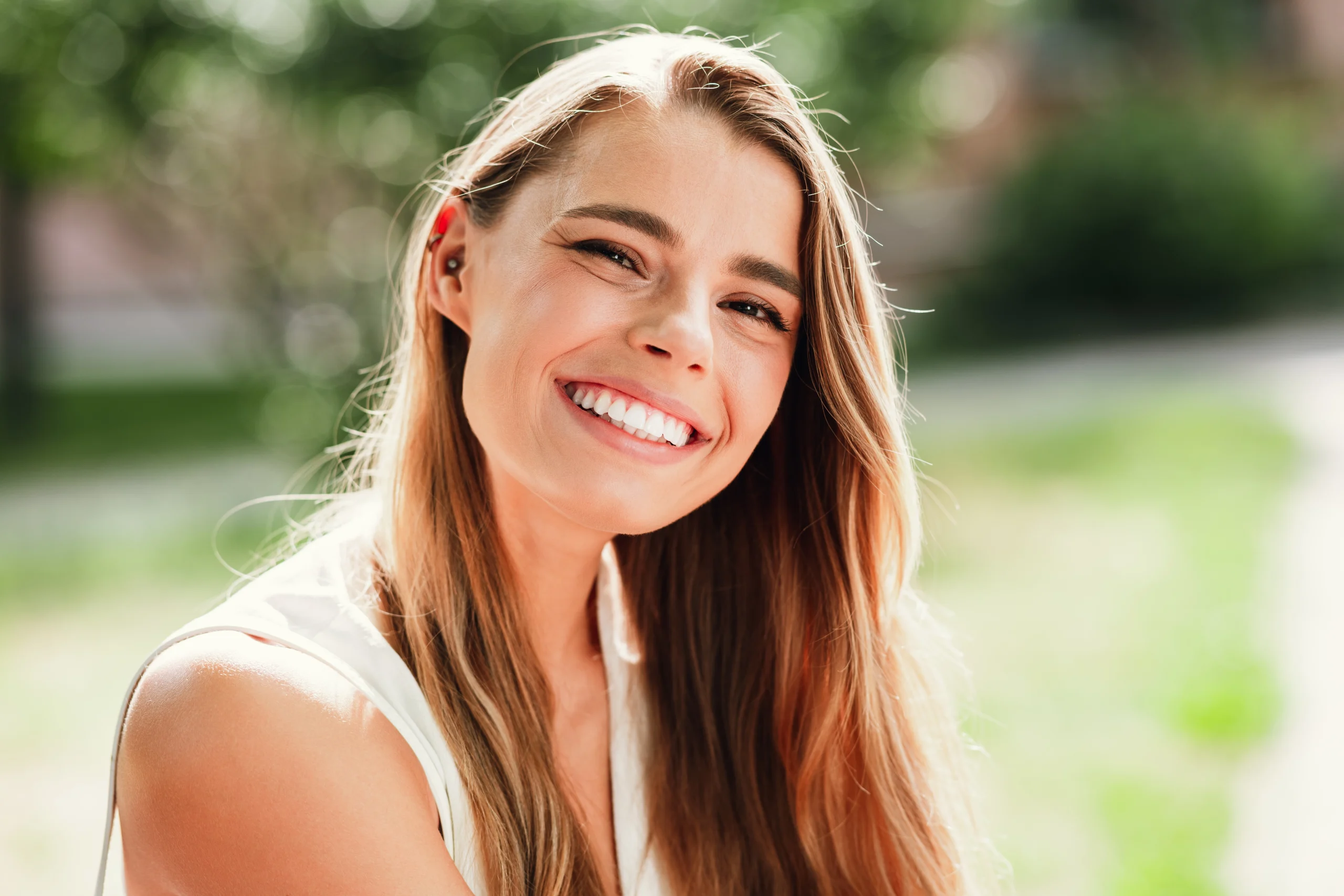 Smiling woman with long brown hair