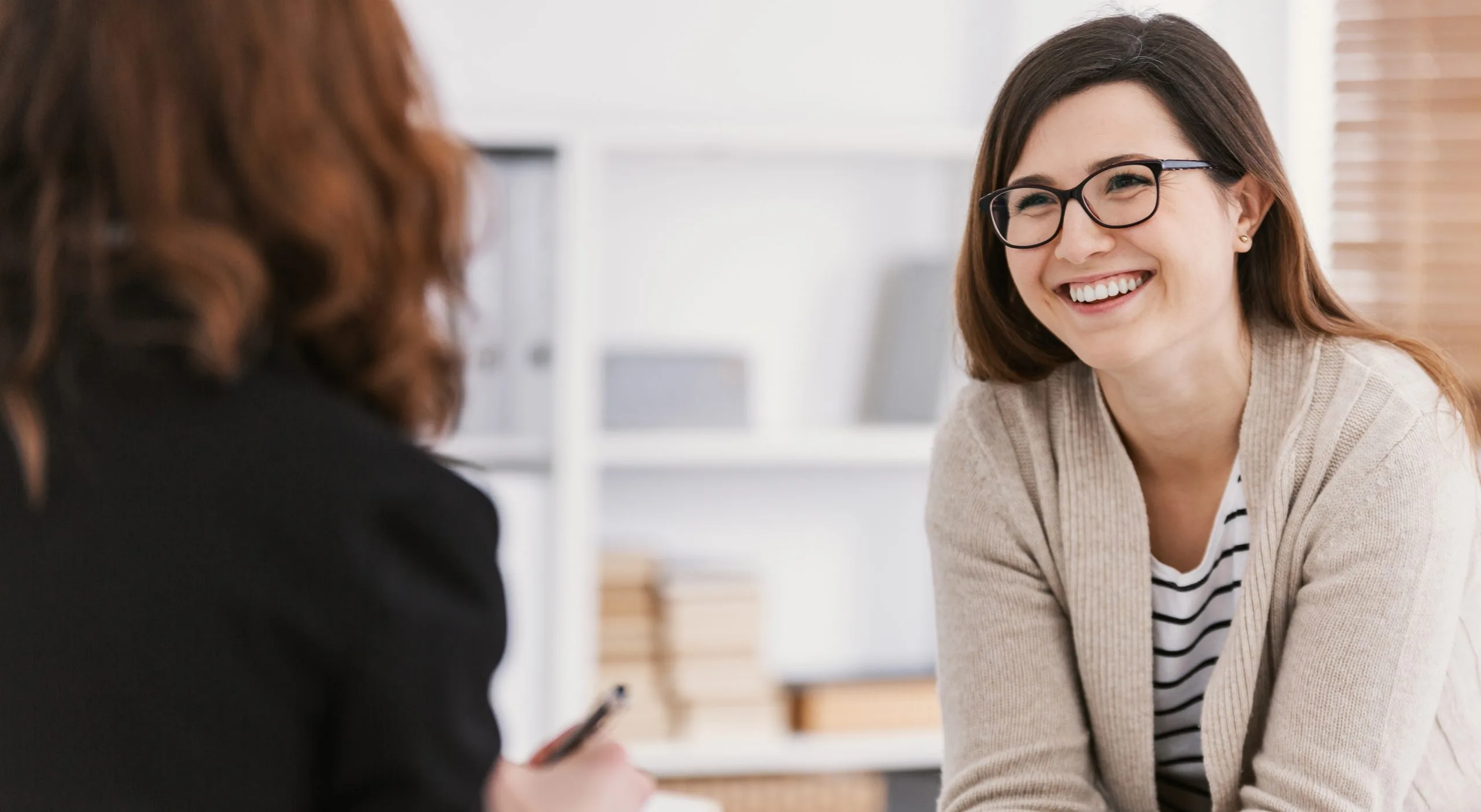 Smiling woman in a therapy session