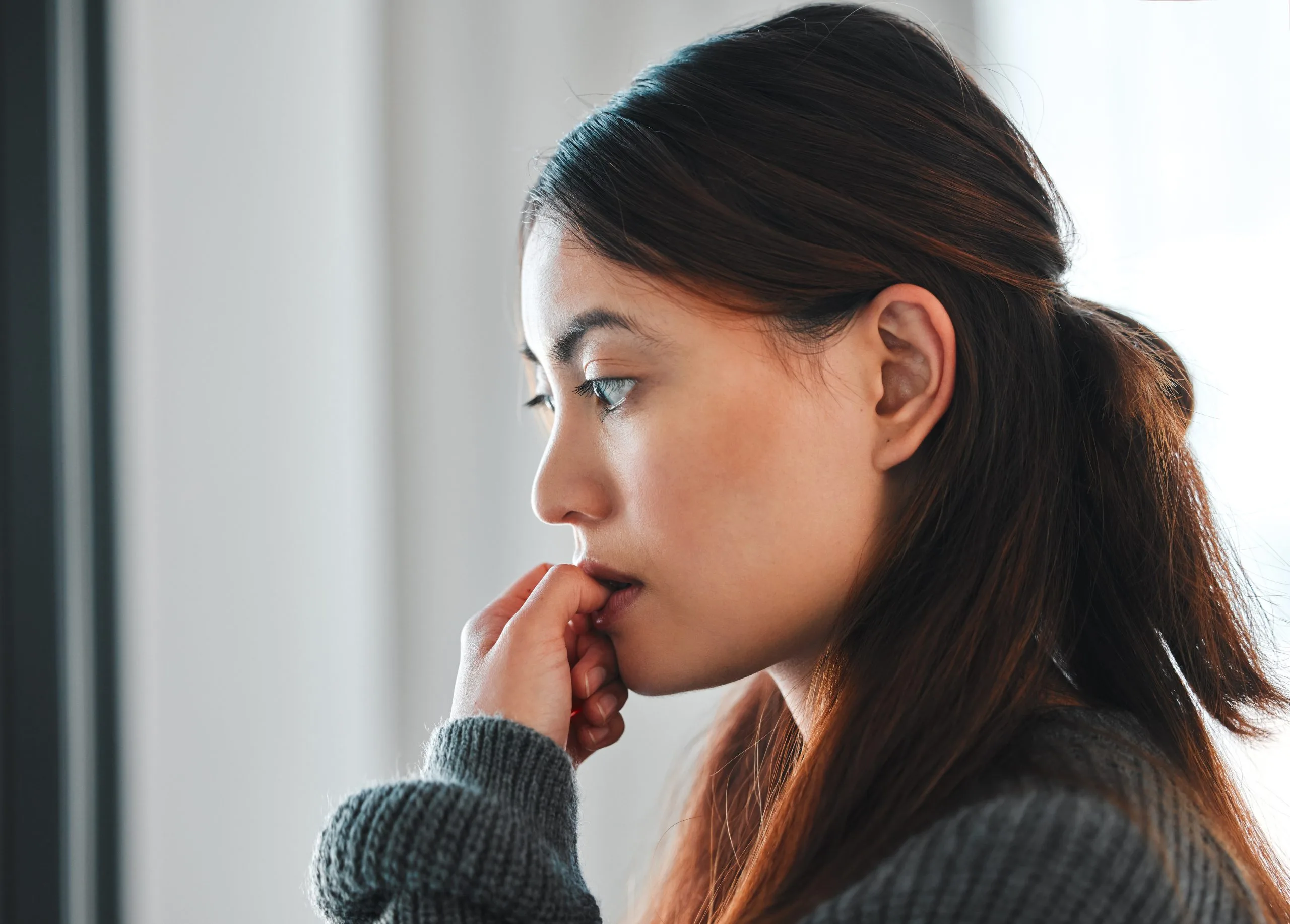 Thoughtful young woman