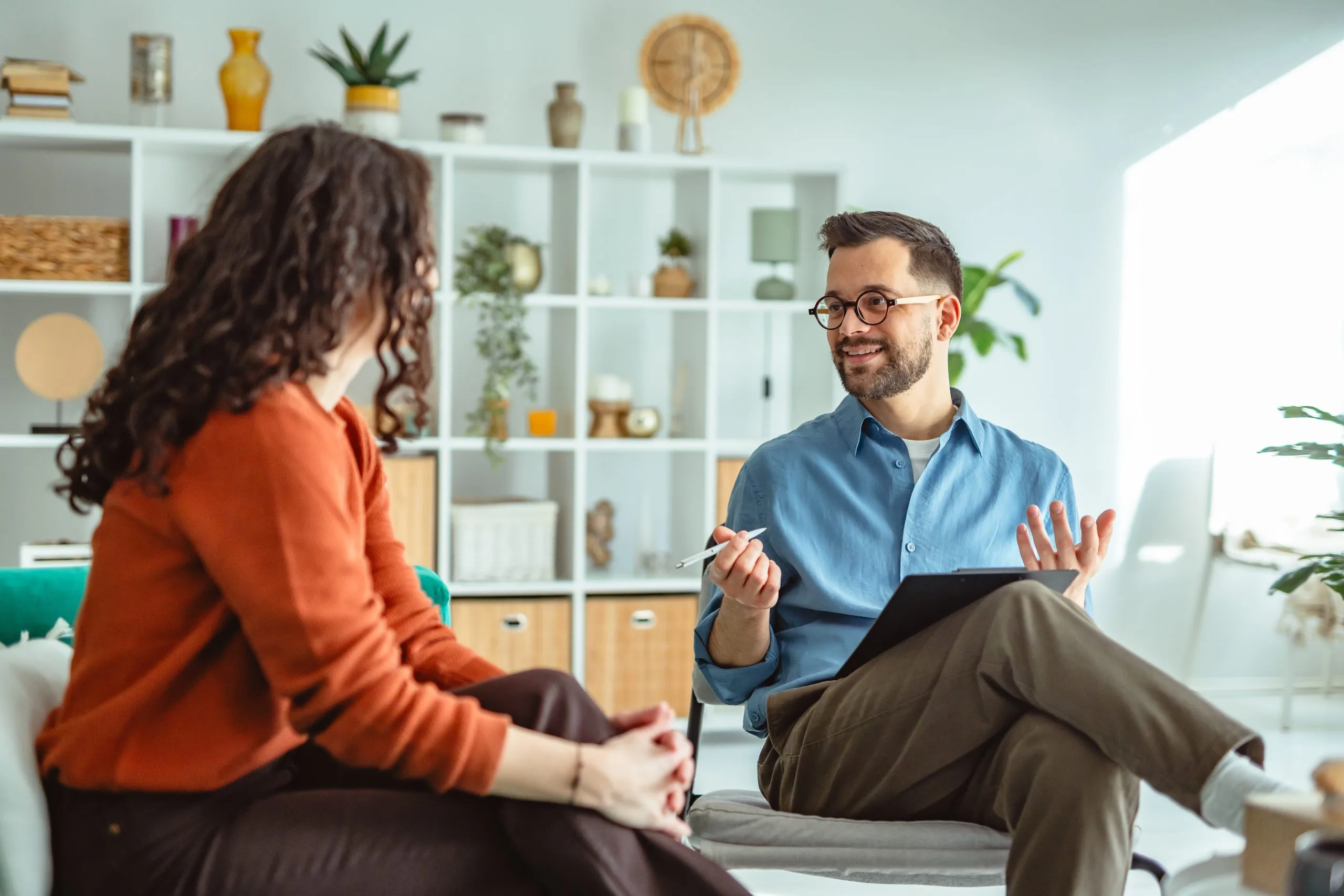 Woman talking with a male therapist