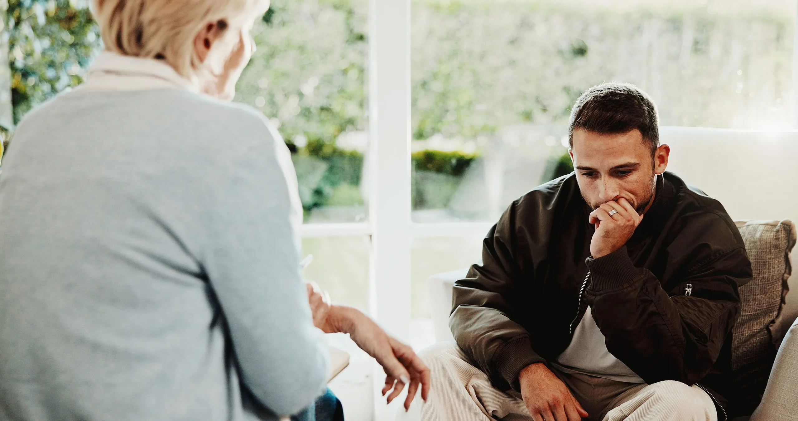 Young man in a session with a therapist