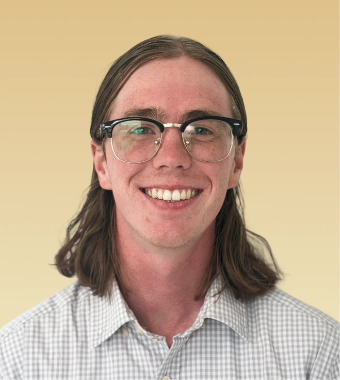 Deegan Eggleston, a team member at Psychiatric and Psychological Specialties, smiling at the camera