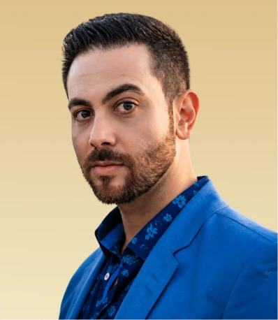 Dr. Shervin Tehrani-Rad, psychologist, headshot against a tan background