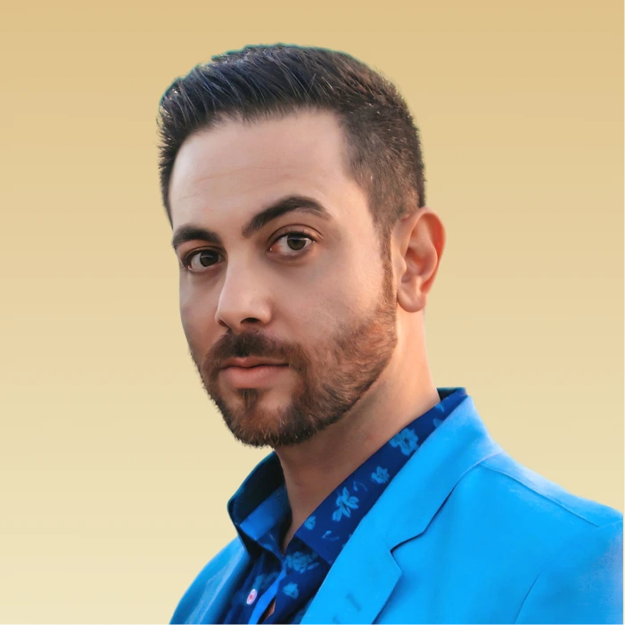 Shervin Tehrani-Rad, Psychologist, headshot against a tan background