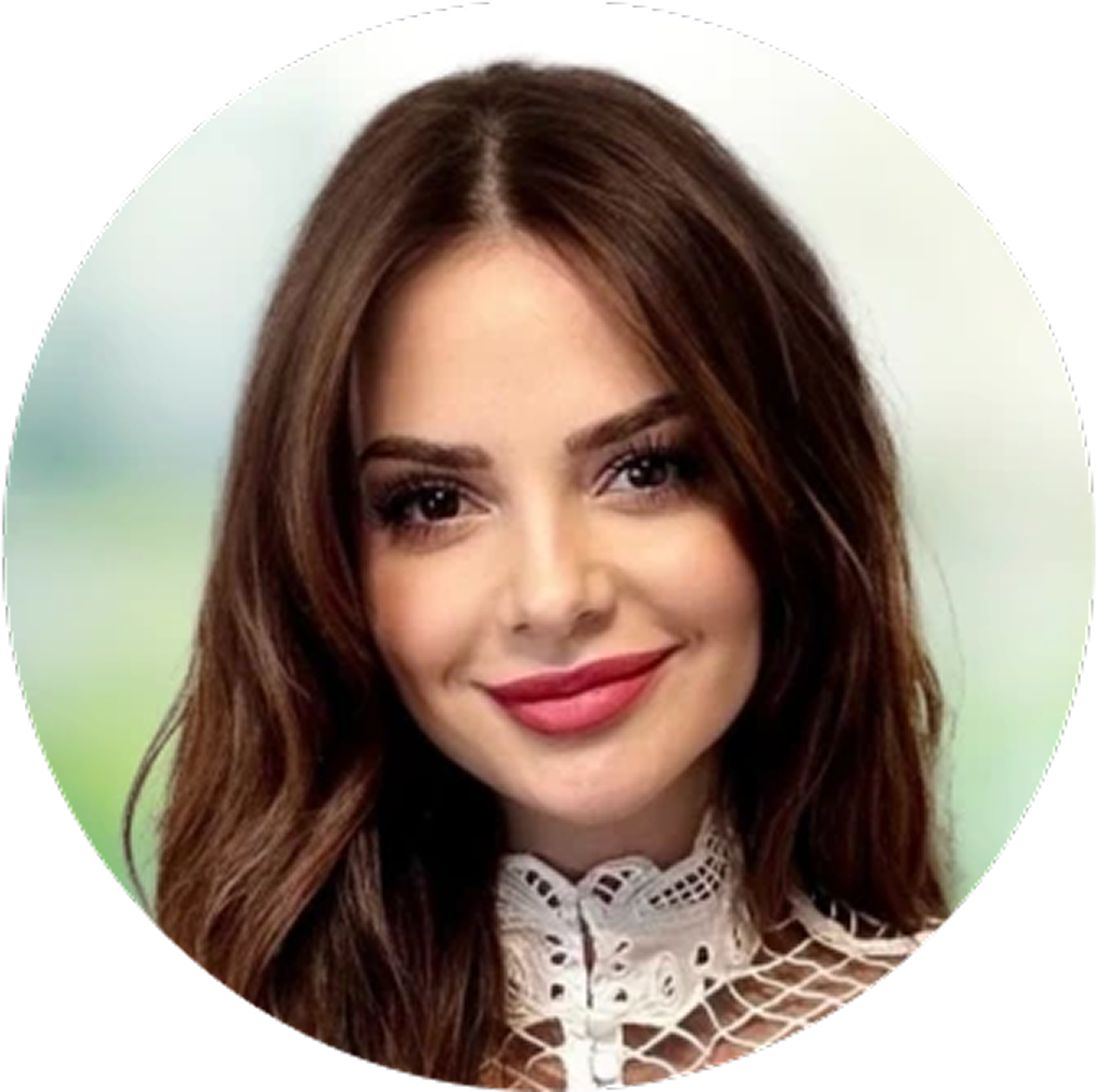 Woman with shoulder-length brown hair and burgundy lipstick wearing lace collar top