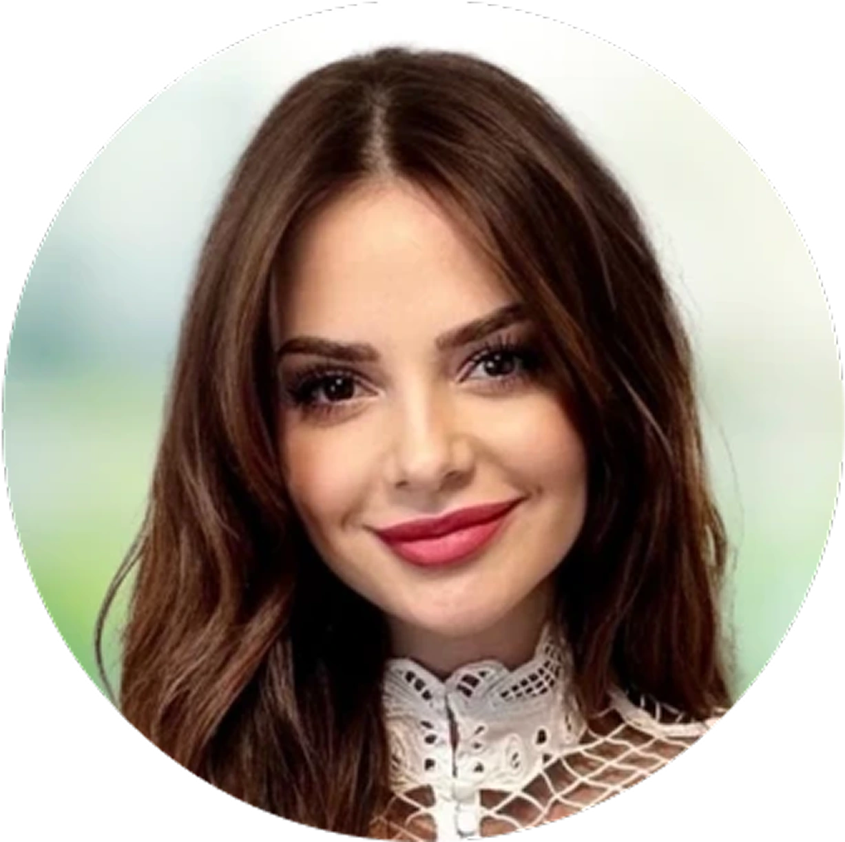 Woman with shoulder-length brown hair and burgundy lipstick wearing lace collar top
