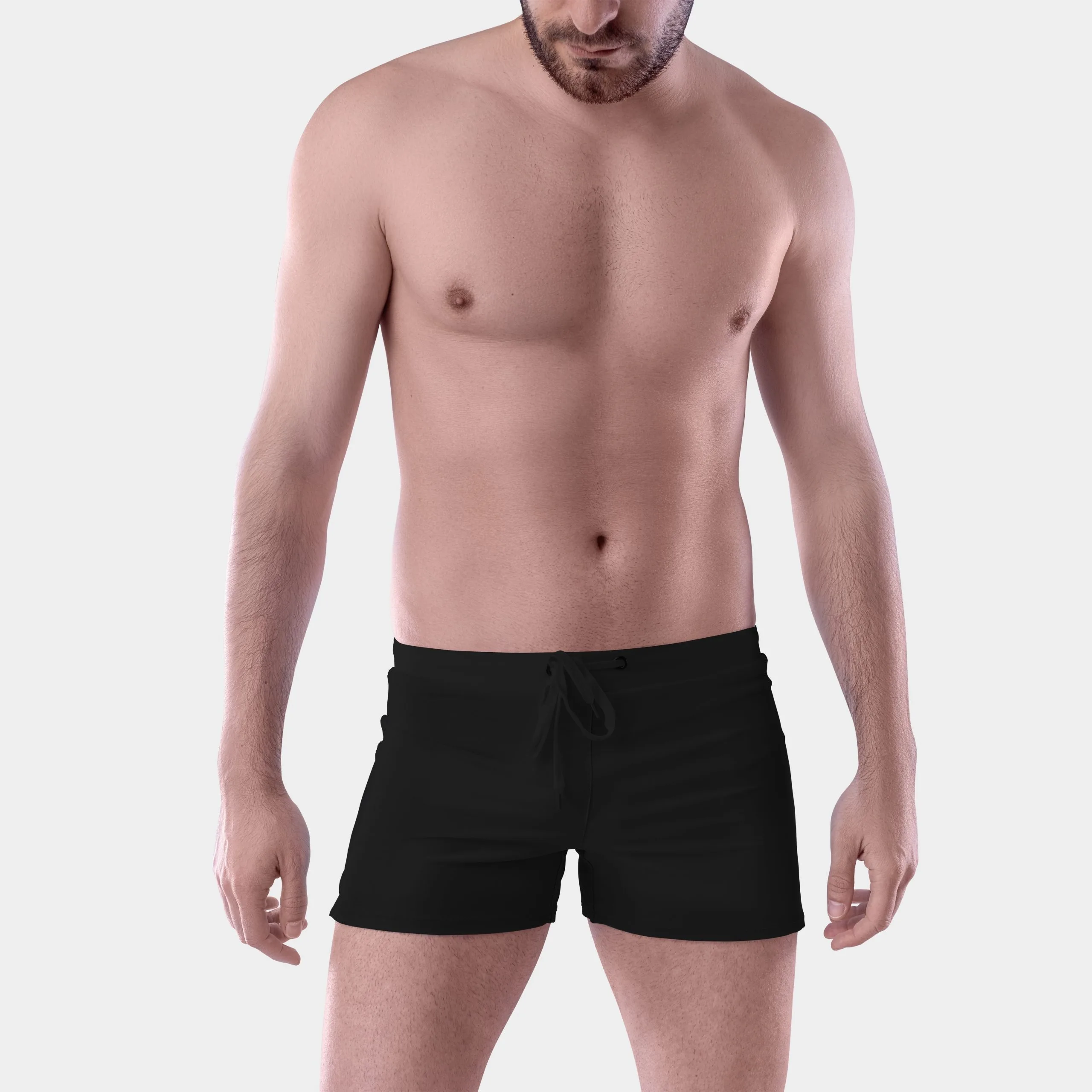 Man wearing black shorts in front view