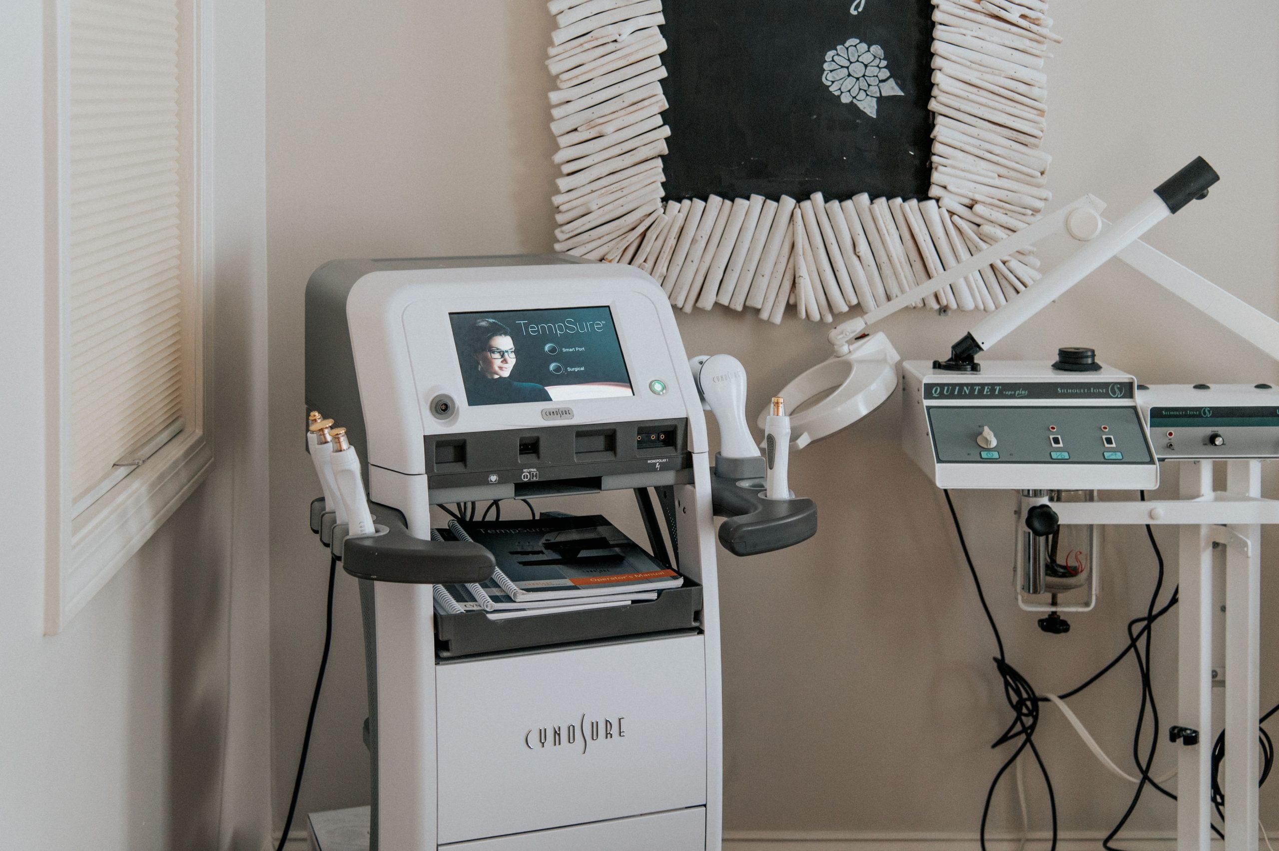 Curasore radiofrequency device and Cutera Quintet laser system in treatment room at Thrive Med Spa + Wellness Portsmouth