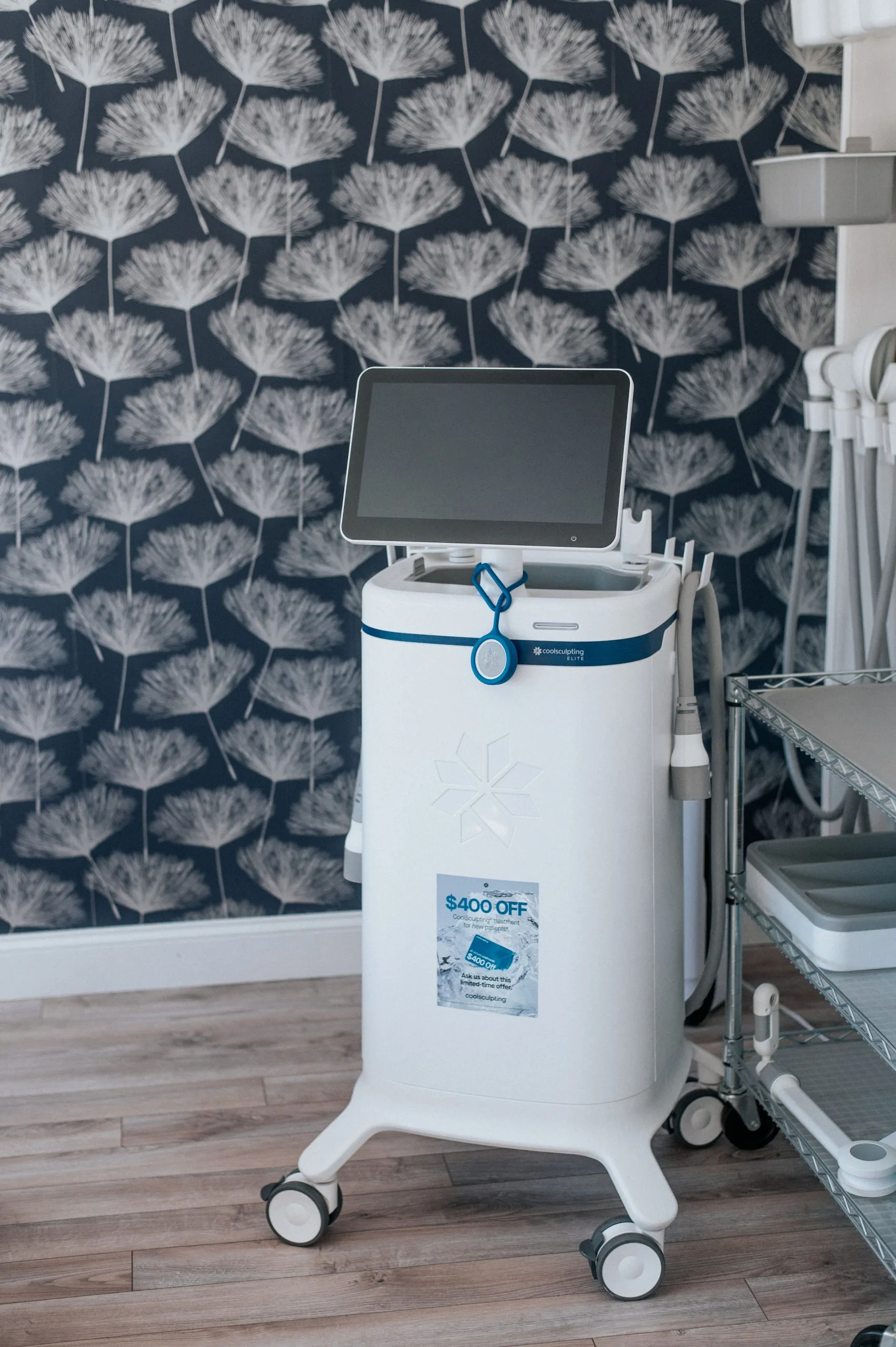 CoolSculpting Elite machine with touchscreen display in Thrive Med Spa treatment room
