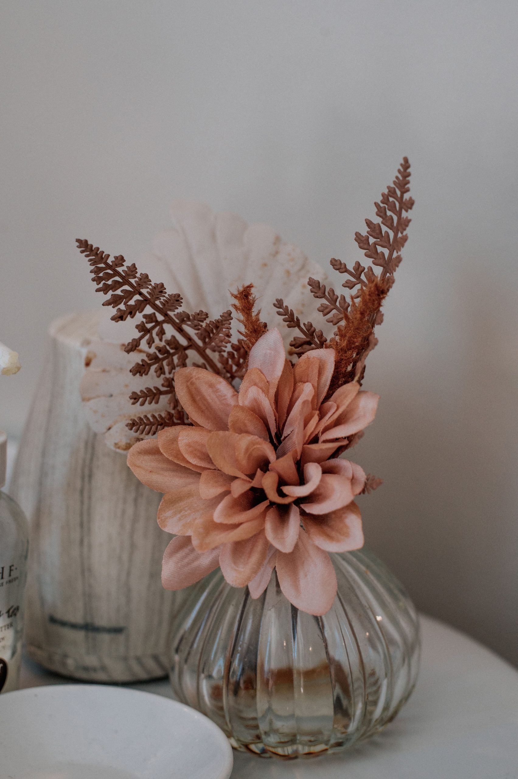 Spa floral arrangement in glass vase