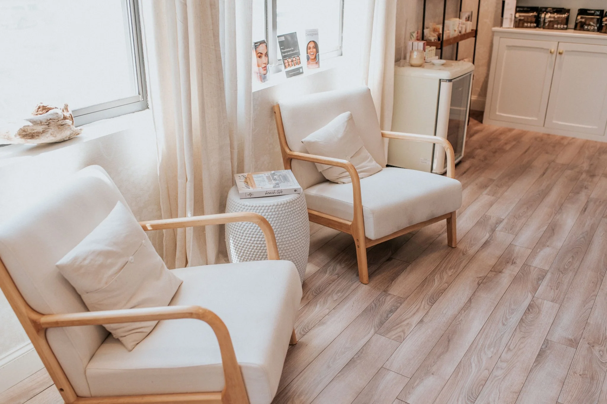 Thrive Med Spa waiting room with cream chairs and natural light