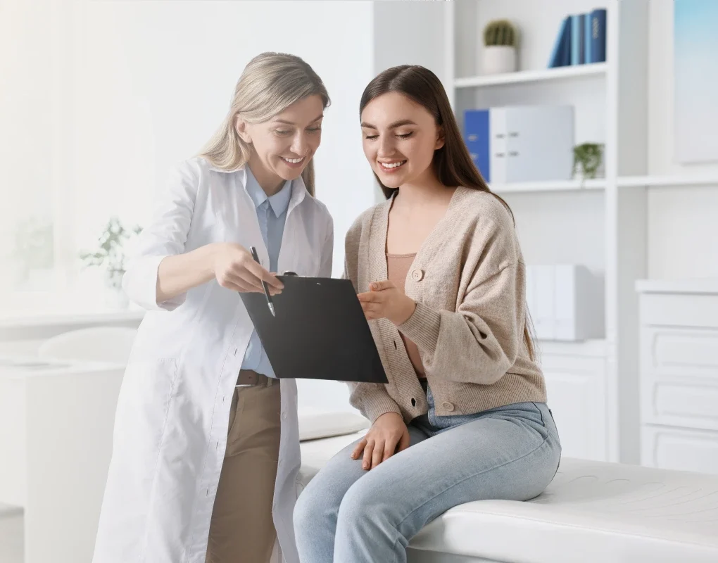 Clinician reviewing a treatment plan with a patient during a ketamine consultation