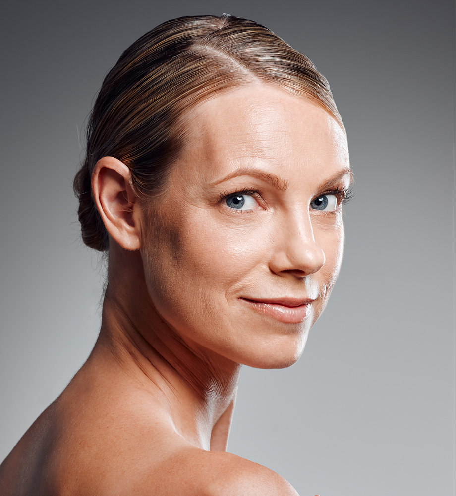 Woman's face in profile showing smooth forehead and skin on the Injectables page