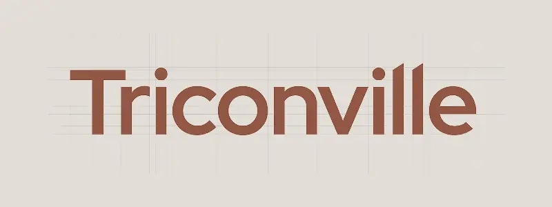 Triconville wordmark on its construction grid