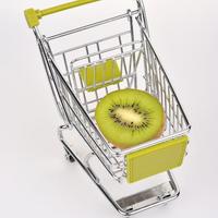 Green shopping cart with Kiwi