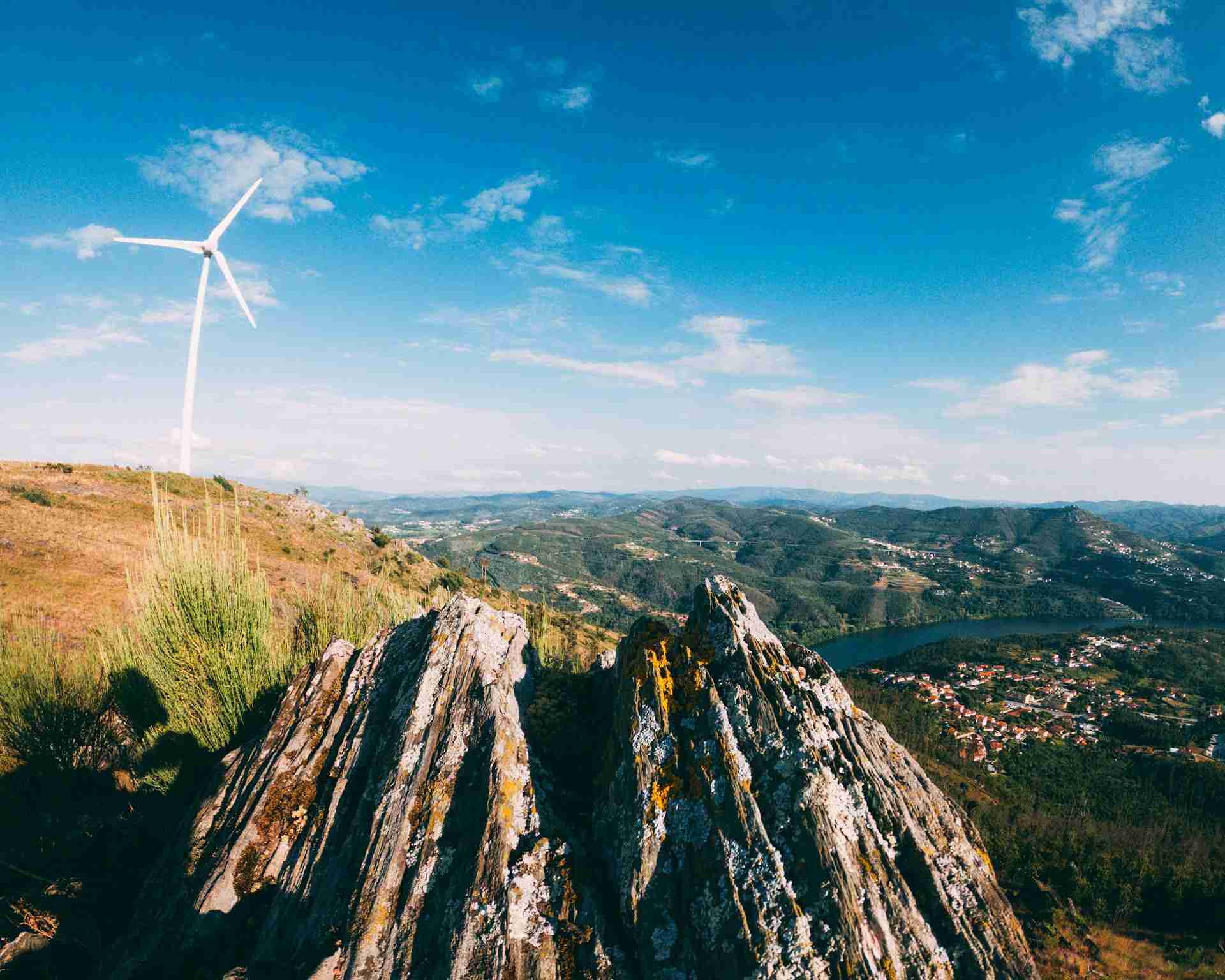 Wind Turbines and Ridge Lines Above the Douro Serra da Boneca Portugal Serra da Boneca is a high ridgeline near the Douro River in northern Portugal that combines open terrain, dramatic sky, and easy access. The hilltop is lined with wind turbines and surrounded by sharp slopes that drop into the surrounding valleys. It’s not a place full of buildings or cultural landmarks, but for photographers interested in space, light, and structure, it’s one of the most rewarding viewpoints in the region. The road climbs steadily to a high point where you can shoot in multiple directions, often without seeing another person. What makes this location work is the balance between wide views, low ground cover, and the repeating verticals of the turbines. It’s a simple setup, but under the right light, it gives strong results with very little effort.
