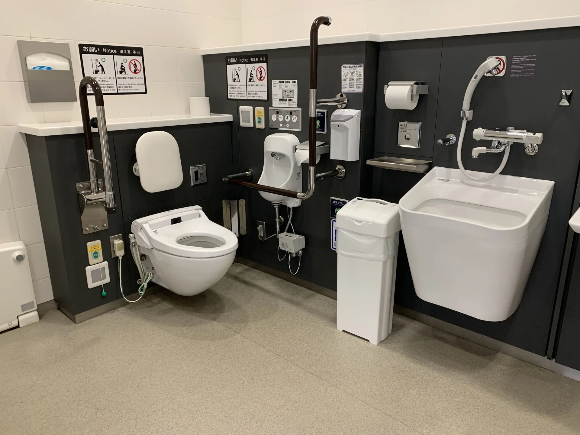 Barrier-free restroom with handrails and spacious area
