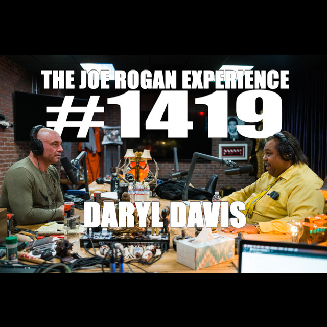 Joe Rogan interviewing Daryl Davis in a podcast studio.