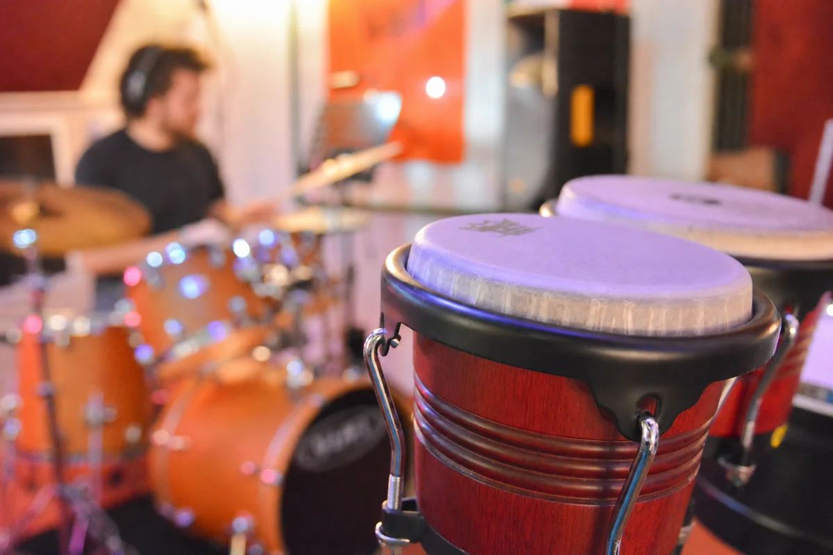 Close-up of bongo drums used in percussion lessons at Planet drum