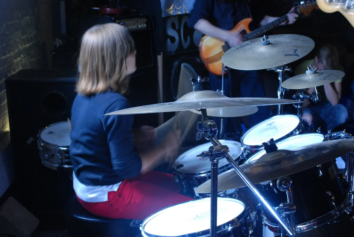 Two children learning together on Planet drum's one-to-two membership
