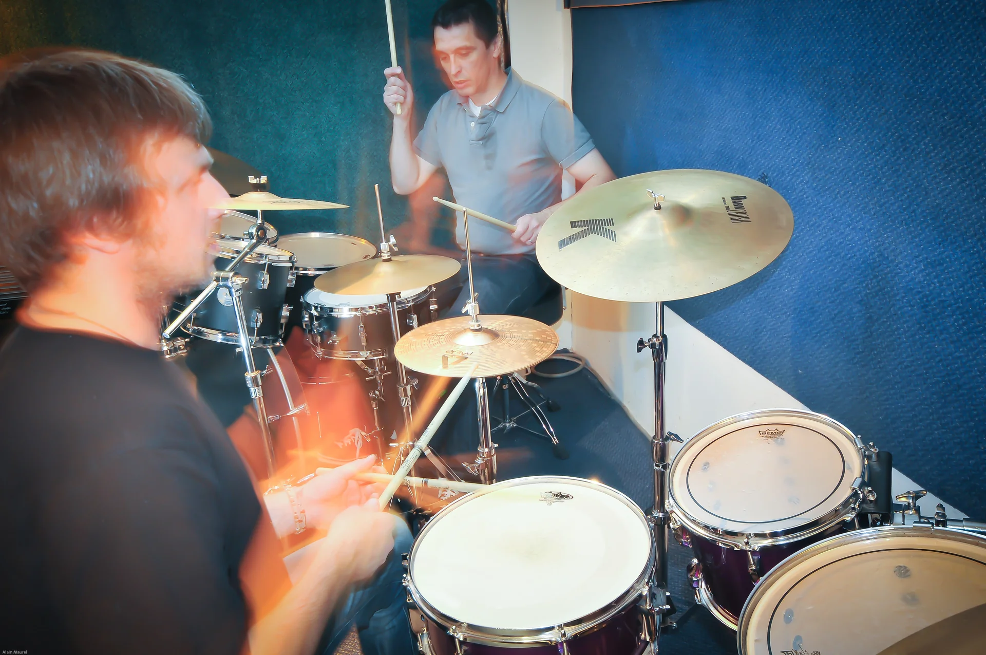 Two drummers playing together at Planet drum