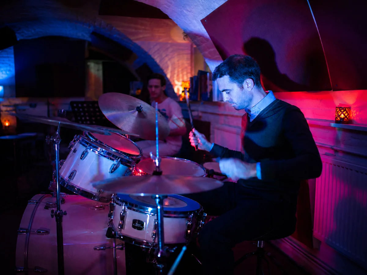 Planet drum tutor guiding a student during a drum taster lesson in Islington